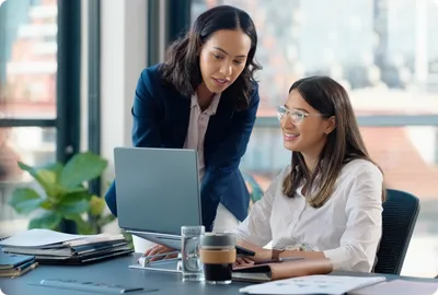 Stock - 2 women collaborating